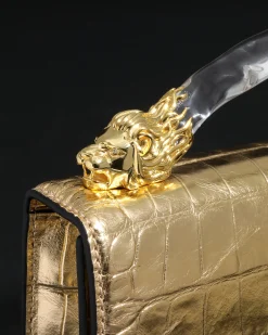 Lioness Top Handle Clutch- Gold